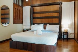 Ein Bett oder Betten in einem Zimmer der Unterkunft The Yard Hostel Chiang Mai