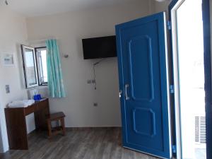 TV a/nebo společenská místnost v ubytování Pounti