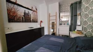 Postel nebo postele na pokoji v ubytování Le Laurier Rose