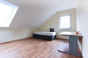 Foto dalla galleria di Gemütliches Doppelhaushälfte a Erlangen Altre 26 foto