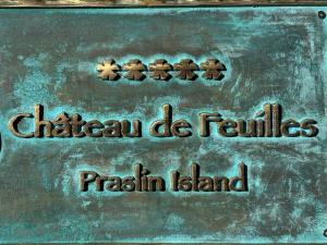 a cake with the wordsnatural de faults potassium island on it at Château de feuilles & SPA - Praslin island in Baie Sainte Anne