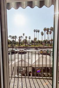 a view of a marina from a window at Suite Riviera 84 in Naples