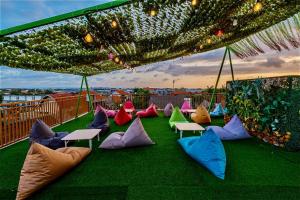 a group of pillows sitting on top of a roof at Sleep Slept Dormitory in Canggu +9 photos