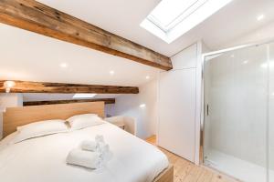 Posteľ alebo postele v izbe v ubytovaní Loft mezzanine vue incroyable Saône