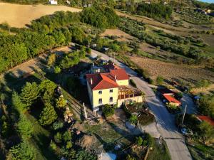 an aerial view of a house with a red roof at La Tana B&B in Flumeri