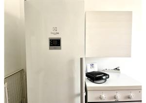A kitchen or kitchenette at Appartamento Le Risaie