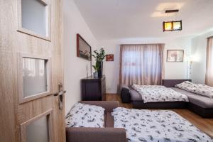 Posteľ alebo postele v izbe v ubytovaní Apartmán ACTIVE