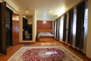 Katil atau katil-katil dalam bilik di Lumwoh Guest House