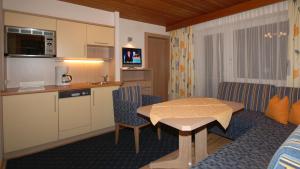 Fotografie z fotogalerie ubytování Appart & Hotel Garni Villa Knauer v Mayrhofenu