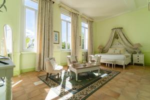 Postel nebo postele na pokoji v ubytování Hôtel l'Orangeraie + 37 fotografií
