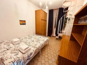 Postel nebo postele na pokoji v ubytování Domus Caelestia