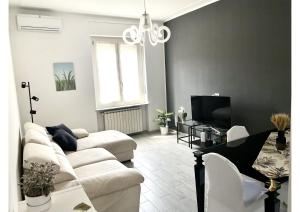 A seating area at Appartamento Le Risaie