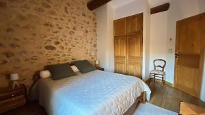 Ένα ή περισσότερα κρεβάτια σε δωμάτιο στο Gite Aigues Vives - Les Jardins +37 φωτογραφίες