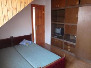 Llit o llits en una habitació de Kerámiapark Guesthaus