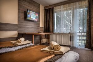 Postel nebo postele na pokoji v ubytování Penzion Limba