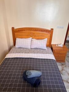 Ένα ή περισσότερα κρεβάτια σε δωμάτιο στο Coquet F2 Jnane el Atlas Ifrane