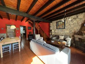 a living room with a couch and a table at Casa Lula 1 Pendueles LLanes AR-685-AS in Llanes