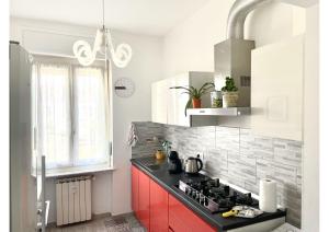 A kitchen or kitchenette at Appartamento Le Risaie