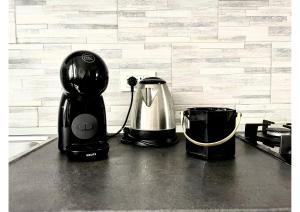 Coffee and tea making facilities at Appartamento Le Risaie