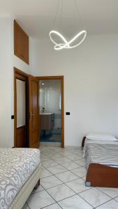Postel nebo postele na pokoji v ubytování B&B Eracle