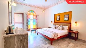 Anantvan Ranthambore By Greetoe Resorts客房内的一张或多张床位