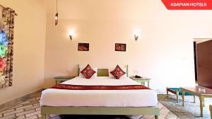 Anantvan Ranthambore By Greetoe Resorts客房内的一张或多张床位