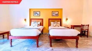 Anantvan Ranthambore By Greetoe Resorts客房内的一张或多张床位