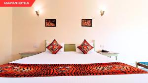 Anantvan Ranthambore By Greetoe Resorts客房内的一张或多张床位