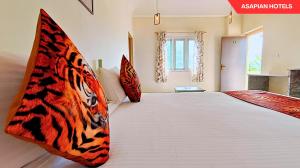 Anantvan Ranthambore By Greetoe Resorts客房内的一张或多张床位