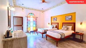 Anantvan Ranthambore By Greetoe Resorts客房内的一张或多张床位