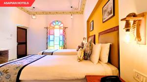 Anantvan Ranthambore By Greetoe Resorts客房内的一张或多张床位