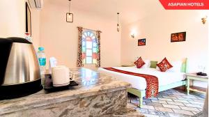 Anantvan Ranthambore By Greetoe Resorts客房内的一张或多张床位