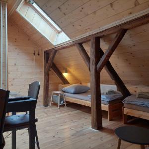 Postel nebo postele na pokoji v ubytování Apartmány U Tří Sluncí