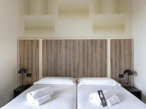 Postel nebo postele na pokoji v ubytování B&B HOTEL Pomezia Cortese