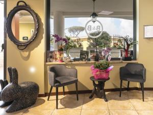 Posezení v ubytování B&B HOTEL Pomezia Cortese