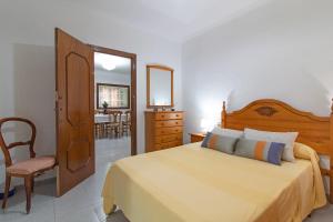 Ένα ή περισσότερα κρεβάτια σε δωμάτιο στο Global Properties, Apartamento en Puerto de Sagunto