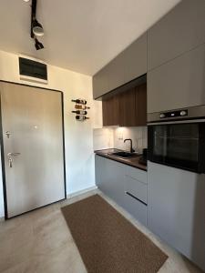 مطبخ أو مطبخ صغير في The Nest Apartment