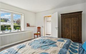 Letto o letti in una camera di Nice Apartment In Bindslev With Wifi