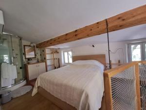 Posteľ alebo postele v izbe v ubytovaní Hameau de la Suyère