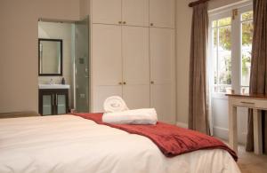 Voodi või voodid majutusasutuse Tokai Forest Guest House toas