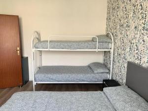 Postel nebo postele na pokoji v ubytování Appartamento a Ravenna - 100 metri dalla spiaggia