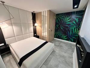 Posteľ alebo postele v izbe v ubytovaní Apartament Południowy W80