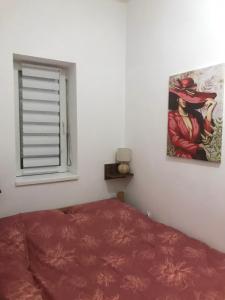 Voodi või voodid majutusasutuse Apartman Dionis SM 2 toas +16 fotot