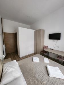 Postel nebo postele na pokoji v ubytování Casa Roxana