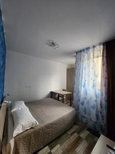 Postel nebo postele na pokoji v ubytování Casa Roxana + 32 fotografií