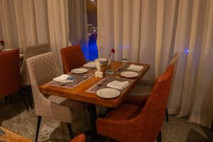 Restaurace v ubytování Pride Elite, Daman