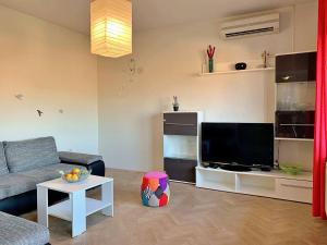 Telewizja i/lub zestaw kina domowego w obiekcie Apartment Rozi