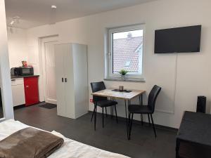 Η κουζίνα ή μικρή κουζίνα στο Ferienzimmer Frank, Self-Check-in nach 21Uhr