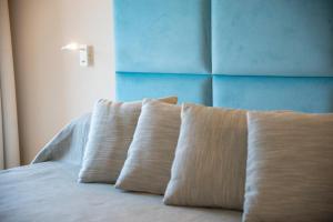 Ein Bett oder Betten in einem Zimmer der Unterkunft Hotel Fabricia