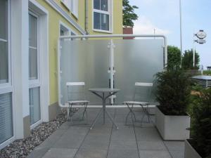 Ein Balkon oder eine Terrasse in der Unterkunft Dünenresidenz A05